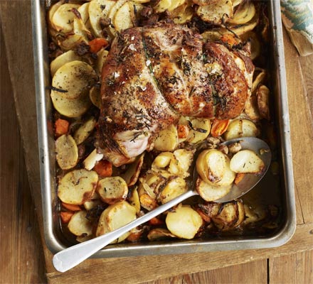 Garlic roast lamb with hotpot potatoes