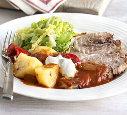 Pot-roast pork goulash with potatoes & greens