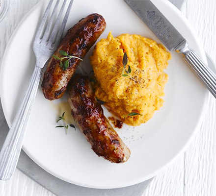 Peppery sausages with sweet potato mash