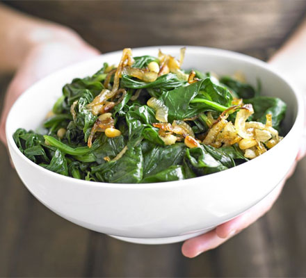 Spinach with onions & pine nuts