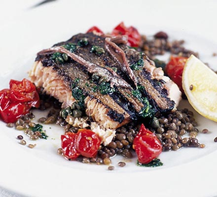 Grilled wild salmon with anchovies, capers & lentils