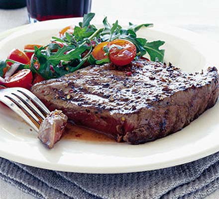 Coriander steaks with tomato & rocket salad