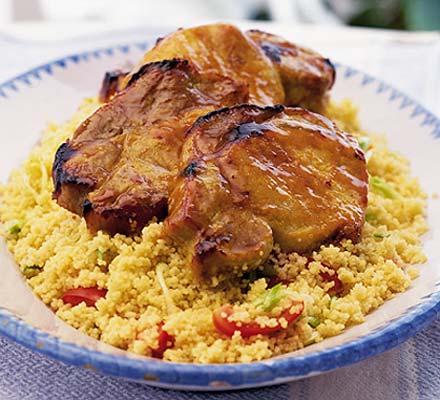 Sticky glazed pork with spring onion couscous