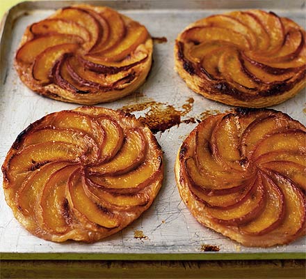 Squashed peach & almond tarts