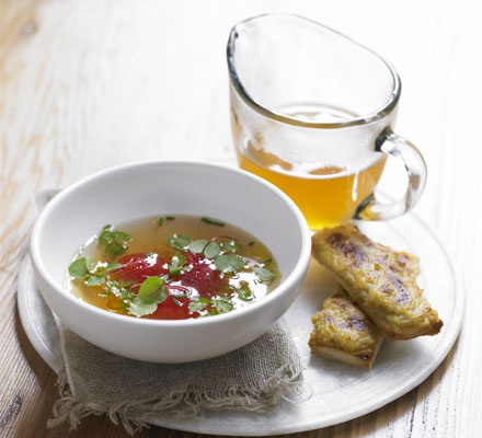 Tomato consommé with Lancashire cheese on toast