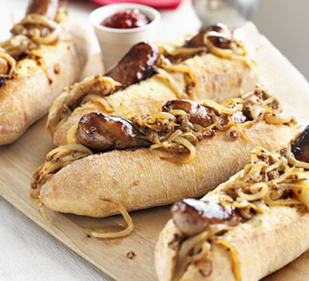 Maple-glazed hot dogs with mustardy onions