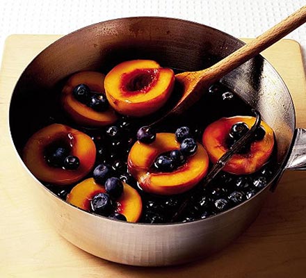Caramel poached peaches with blueberries