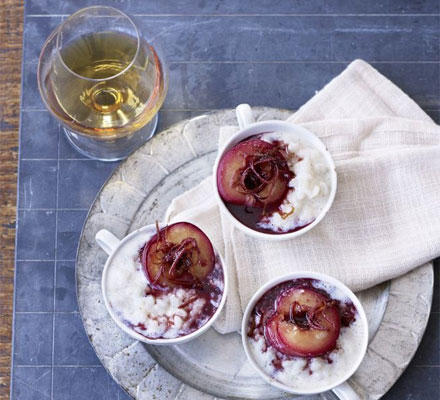 Creamy rice pudding with stewed plums