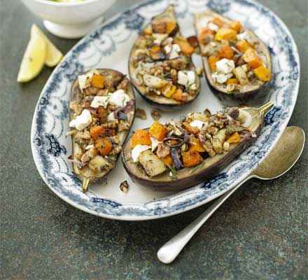 Baked aubergine stuffed with roast pumpkin, feta & walnut with minted courgettes