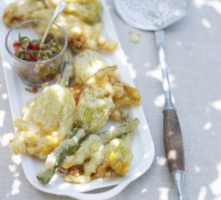 Stuffed courgette flowers with olive dressing