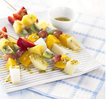 Frozen fruit sticks with passion fruit & lime drizzle