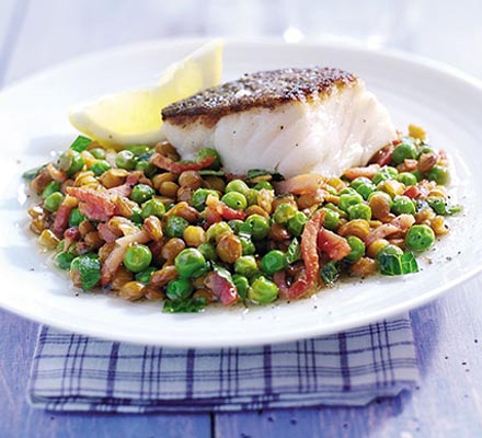 Braised peas with bacon, lentils & cod