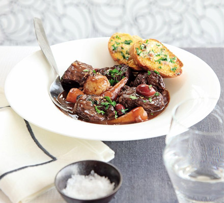 Braised beef with anchovy toasts