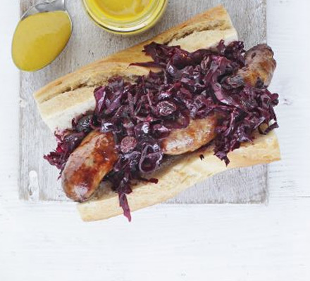 Sausages with warm red cabbage & beetroot slaw