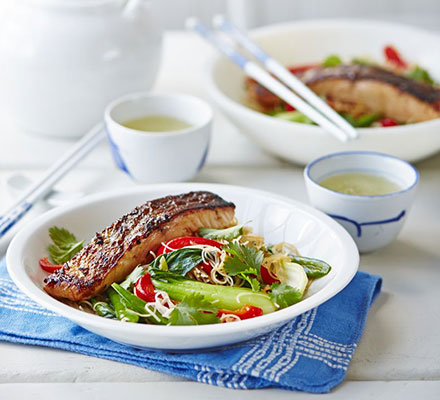 Crispy Asian salmon with stir-fried noodles, pak choi & sugar snap peas