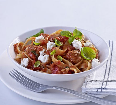 Creamy tagliatelle with sausage, ricotta & basil