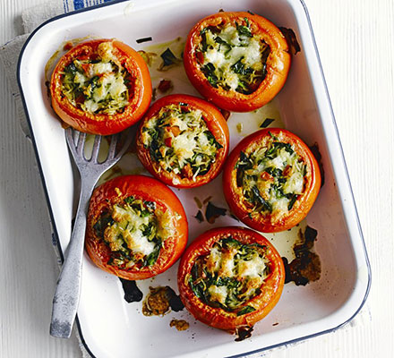 Tomatoes stuffed with pesto rice