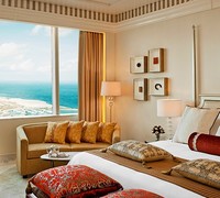 This NYE staycation deal includes beach party access AND late check-out