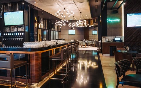 New sports bar offering 2-for-1 snacks and AED25 drinks this month