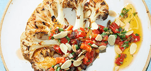 Cauliflower steaks with roasted red pepper & olive salsa