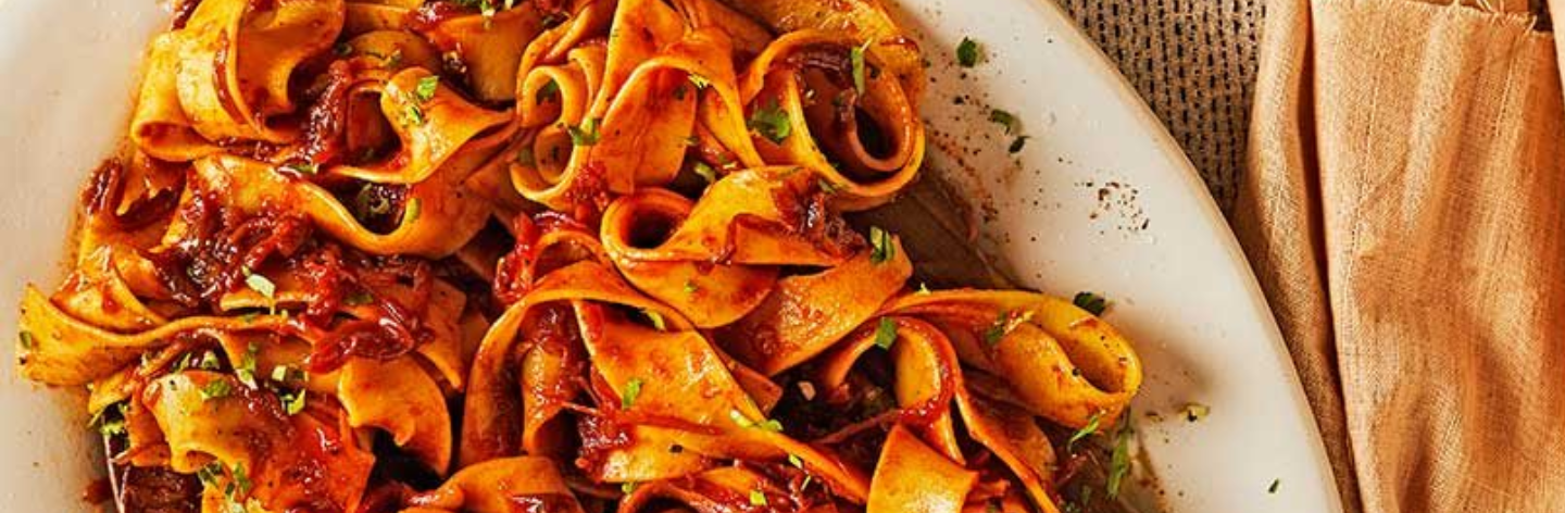 Caramelised red onion & anchovy pasta with gremolata